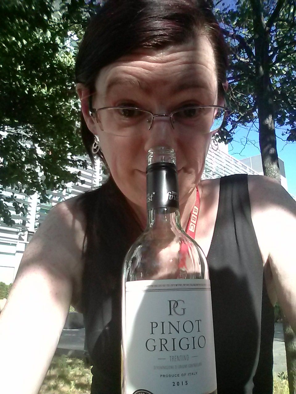 On a Summer's day, me sat outside my workplace, wearing my BBC lanyard, and balancing my nose on an at-least-partly-empty bottle of Pinot Grigio.