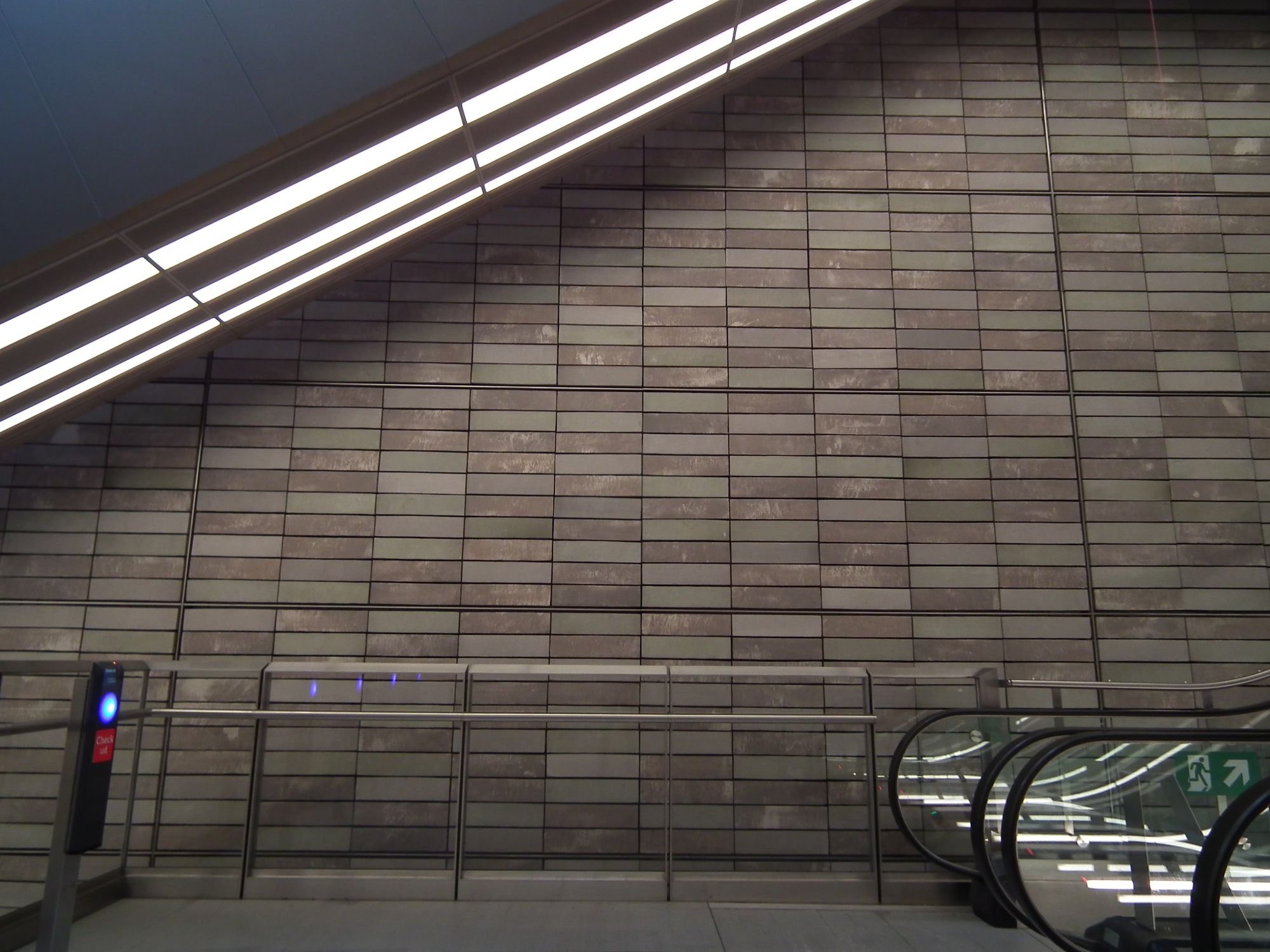 Side wall view, showing the brick-sized brown tiles. These ones don't have the diagonal two-texture feature of the last station, though.