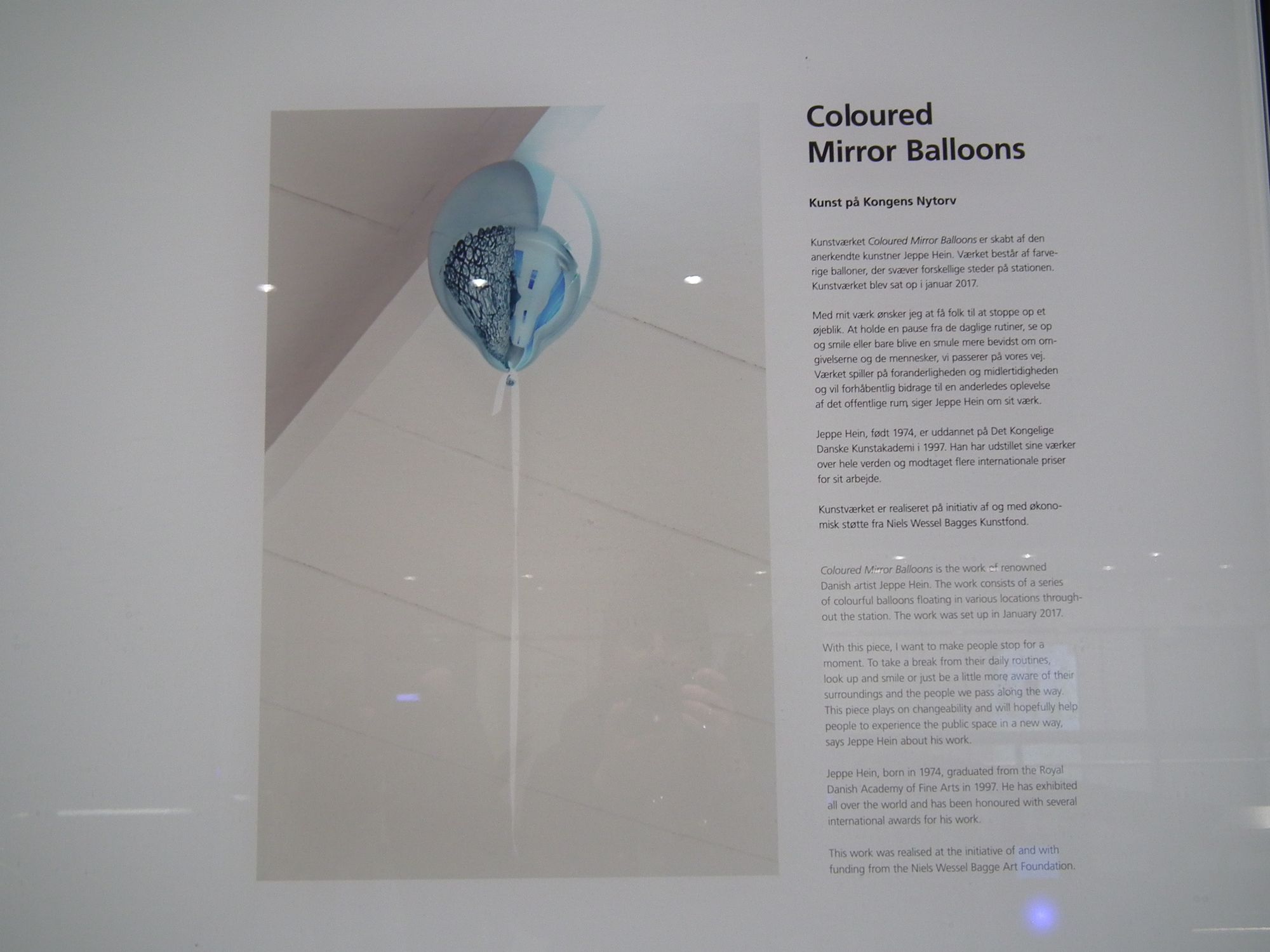 Information panel describing the art 'Coloured Mirror Balloons'. And yes, they've spelt it the British way.
