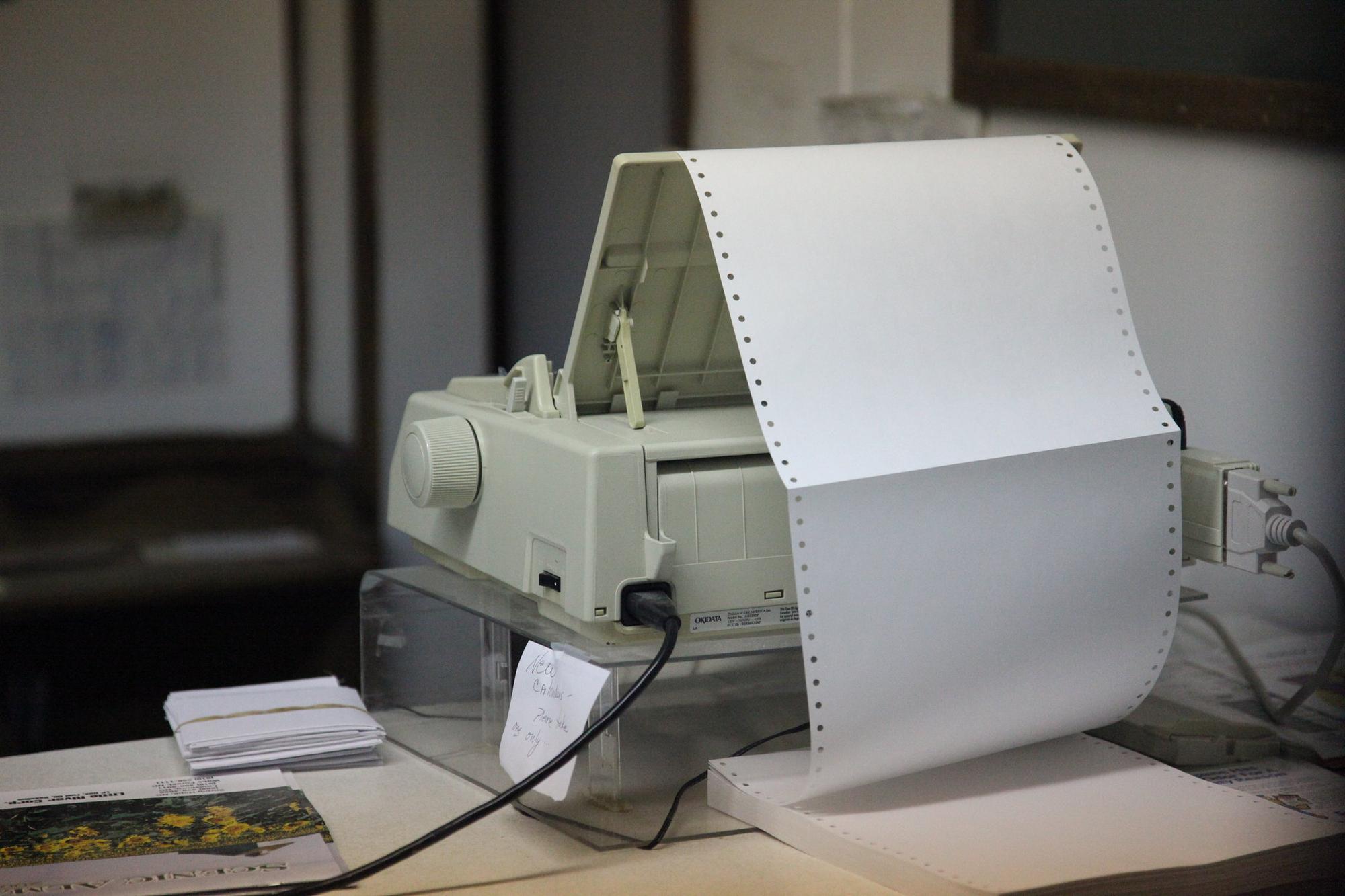 A tractor-feed printer